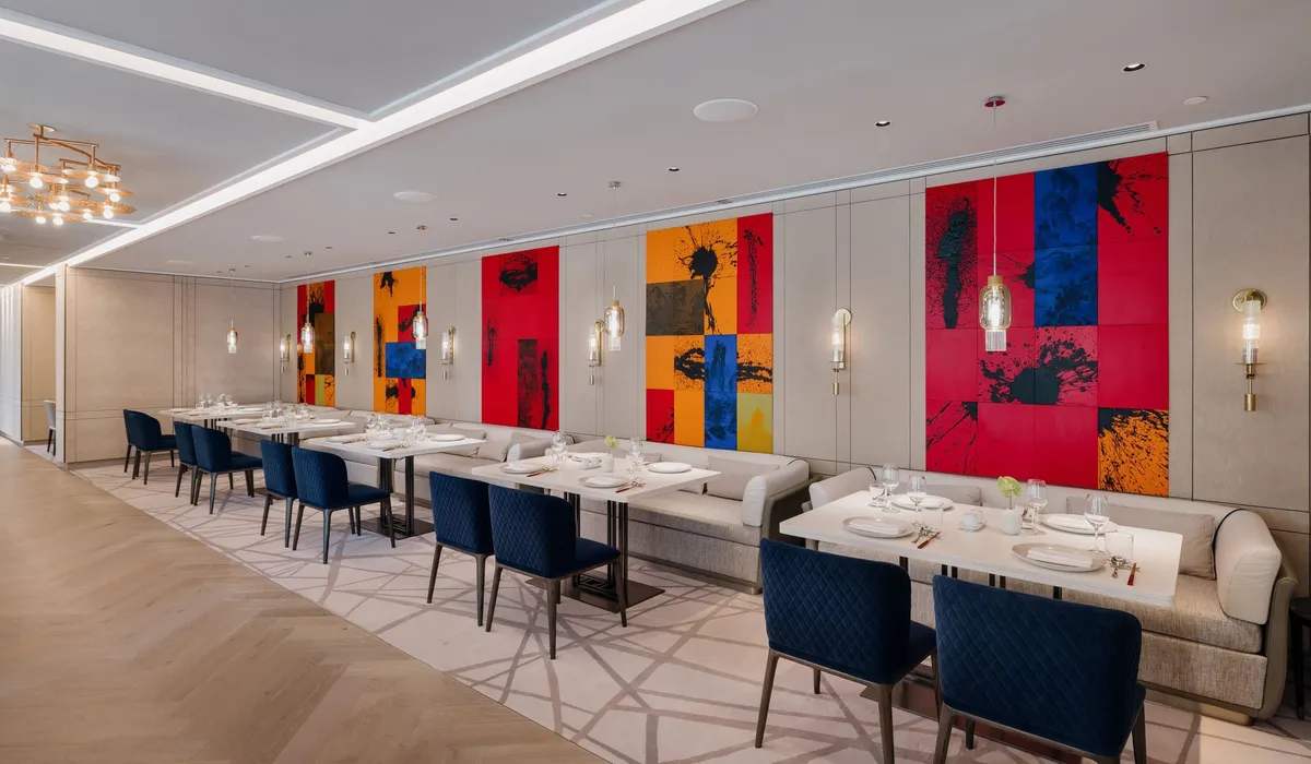 Artist's impression of The Langham, Gold Coast: a restaurant dining room with colorful wall panels