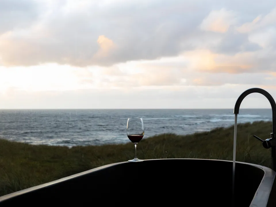 Handmade concrete bath facing the coast