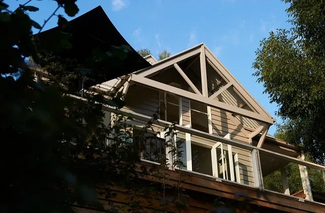 The Retreat accommodation set among the property's mature trees