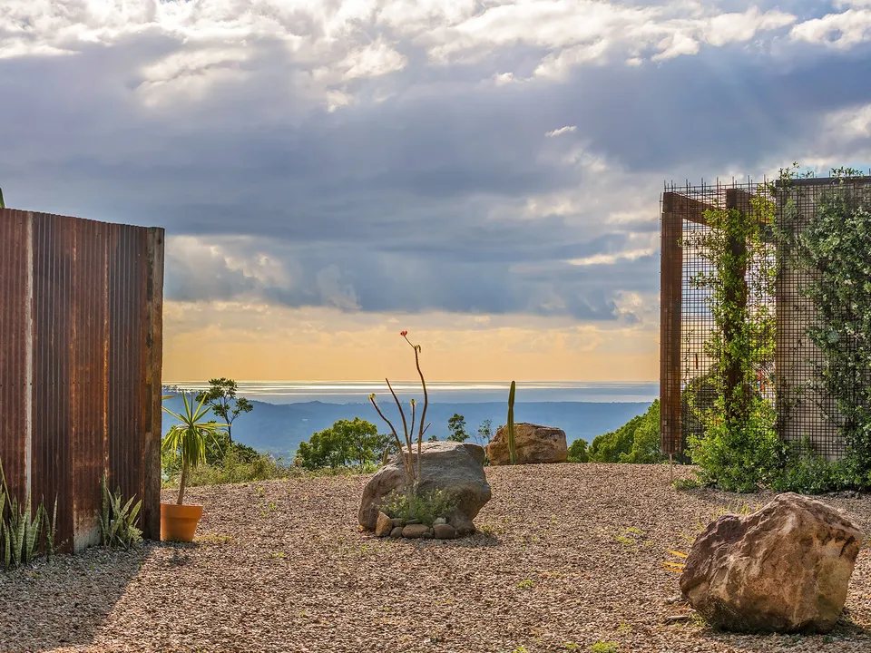 The sculptural garden at Blackbird with views to the Pacific Ocean