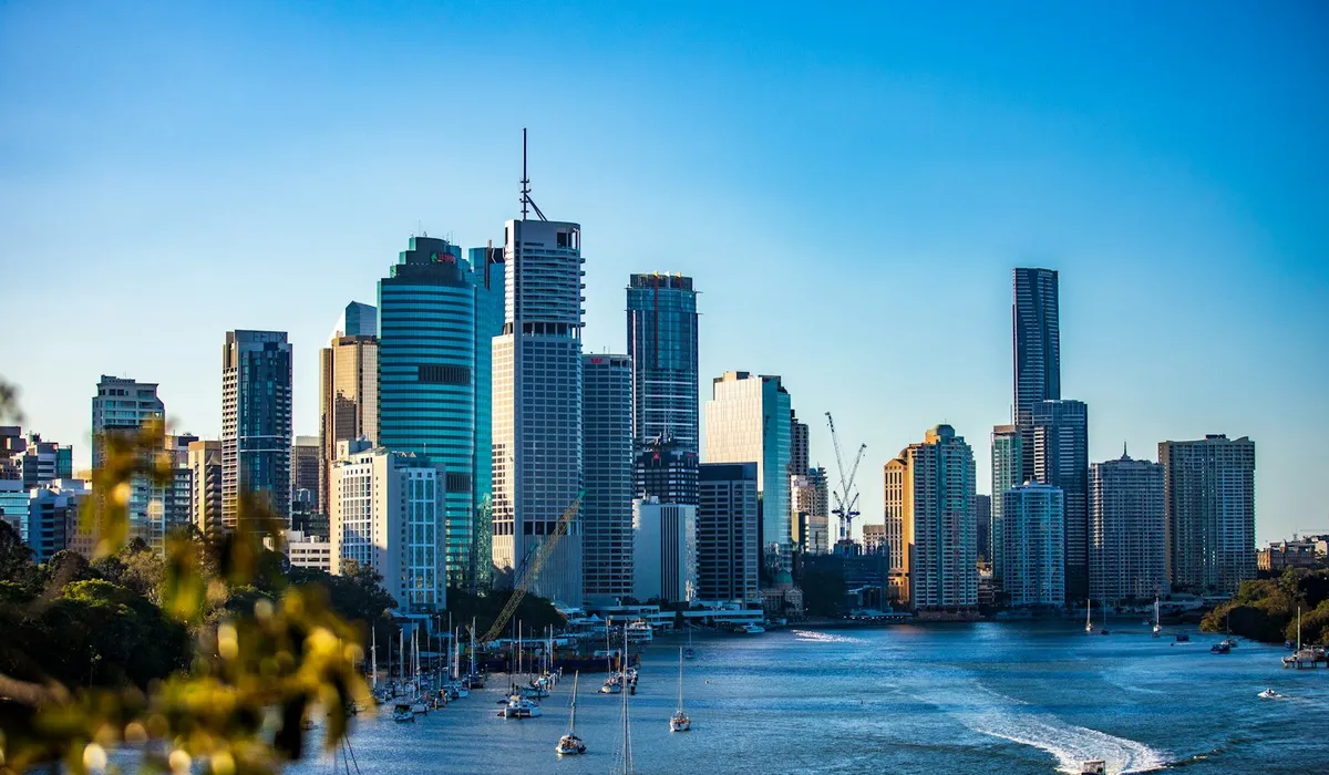Brisbane city skyline reflected in the river at twilight