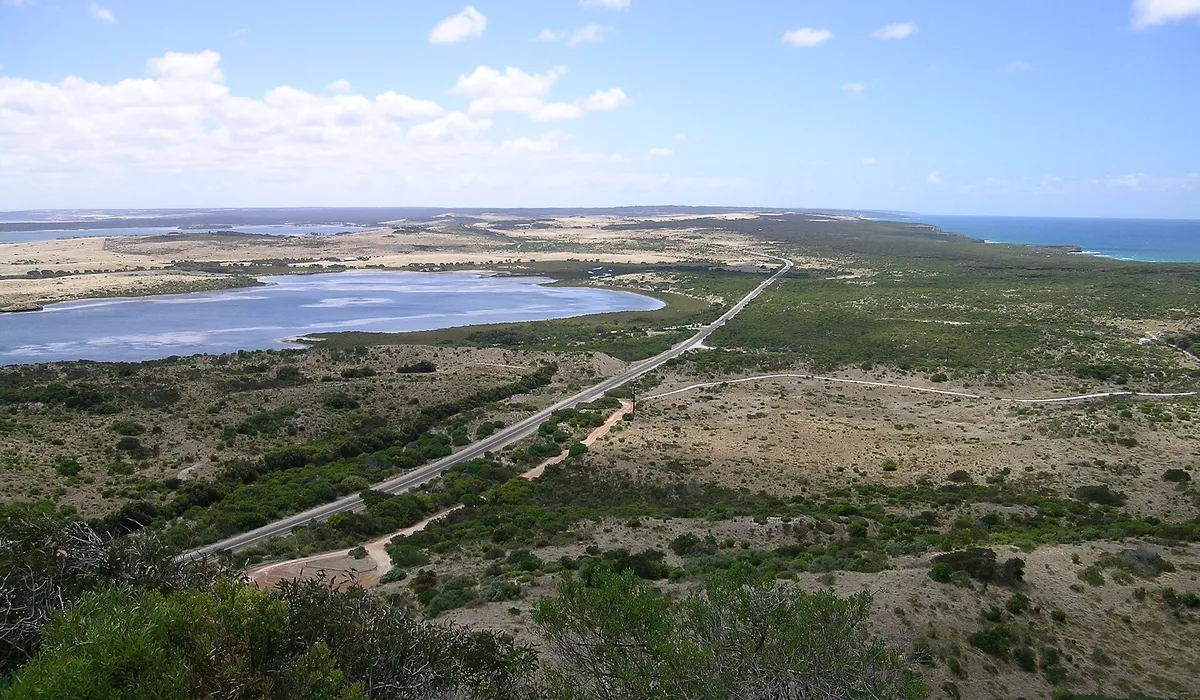 Kangaroo Island: a road crossing coastal scrub beside a lagoon