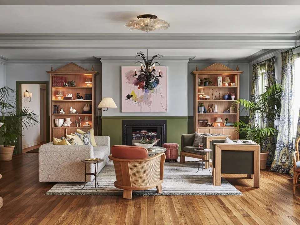 The reception lounge with curated art and open fire
