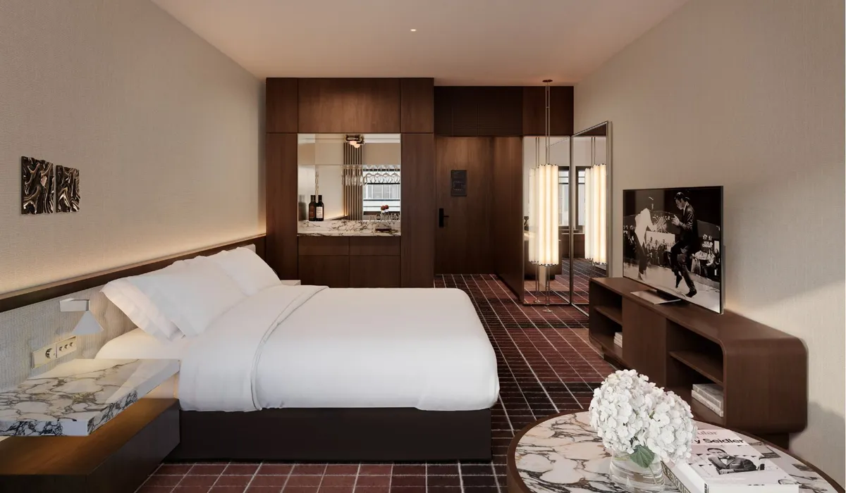 Render of a refurbished king room with dark timber joinery, a red tiled floor and a marble side table