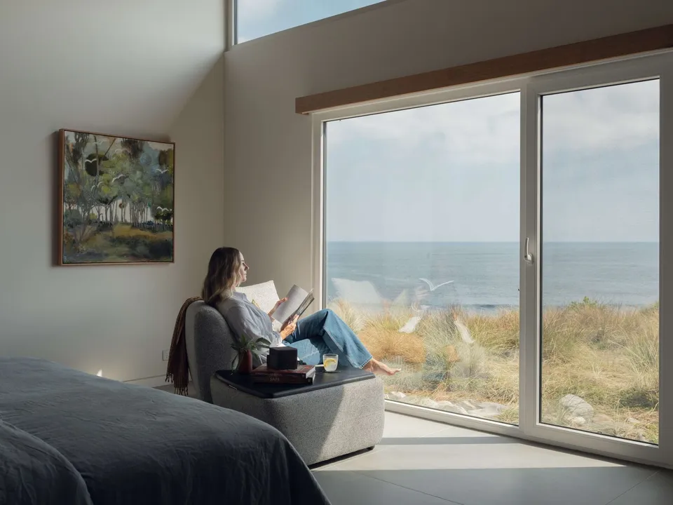 Bedroom with a floor-to-ceiling window to the Southern Ocean