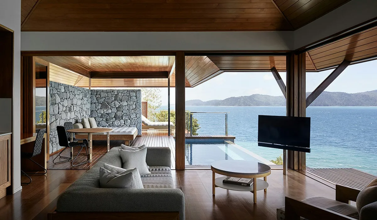 qualia: a pavilion living room opening to a plunge pool and the Whitsundays