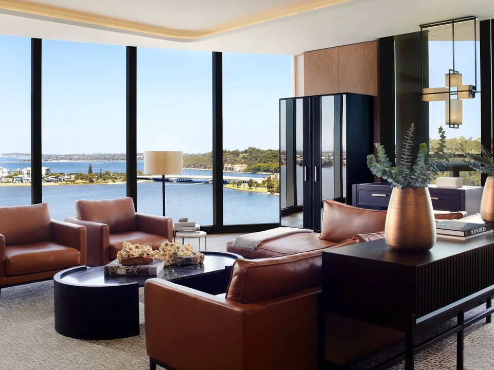 Living room of The Ritz-Carlton Suite, looking across the river